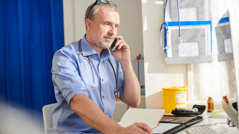 dr on phone at deskv3